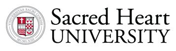 Women's University of the Sacred Heart Logo